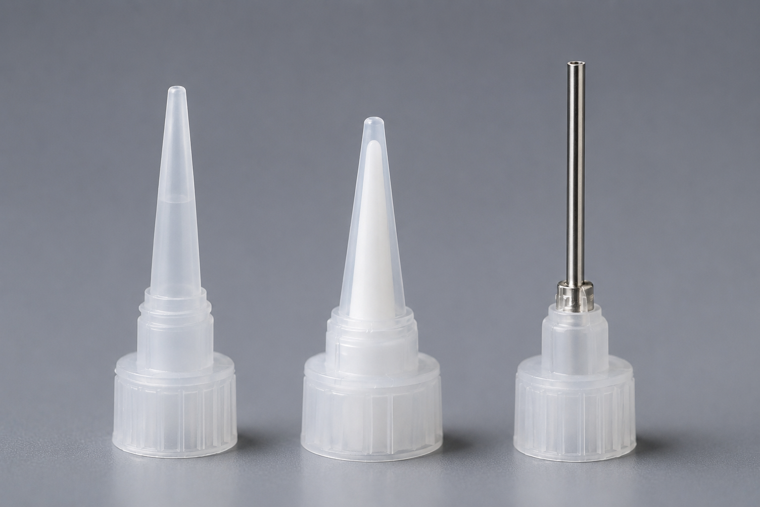 Dispensing tip materials